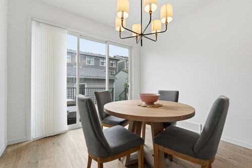 129 Treeline Avenue Sw, Calgary, AB - Indoor Photo Showing Dining Room