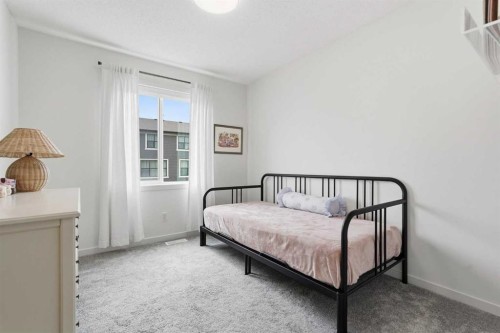 129 Treeline Avenue Sw, Calgary, AB - Indoor Photo Showing Bedroom