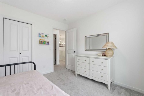 129 Treeline Avenue Sw, Calgary, AB - Indoor Photo Showing Bedroom