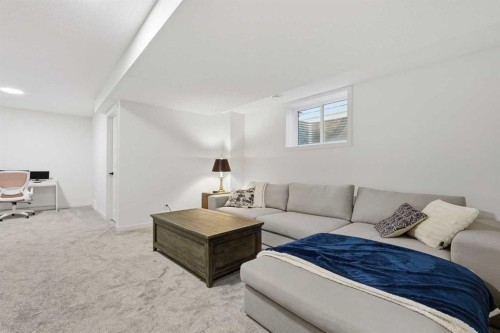 129 Treeline Avenue Sw, Calgary, AB - Indoor Photo Showing Living Room