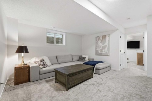129 Treeline Avenue Sw, Calgary, AB - Indoor Photo Showing Living Room