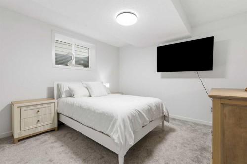 129 Treeline Avenue Sw, Calgary, AB - Indoor Photo Showing Bedroom