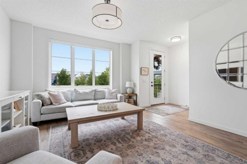 129 Treeline Avenue Sw, Calgary, AB - Indoor Photo Showing Living Room