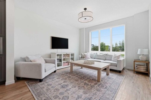 129 Treeline Avenue Sw, Calgary, AB - Indoor Photo Showing Living Room