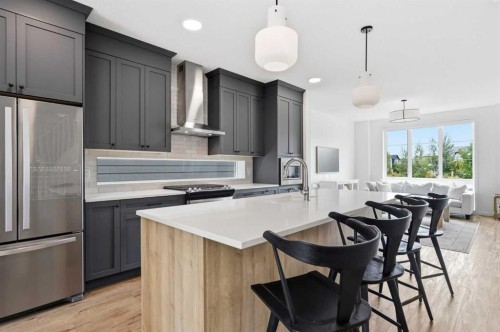 129 Treeline Avenue Sw, Calgary, AB - Indoor Photo Showing Kitchen With Upgraded Kitchen