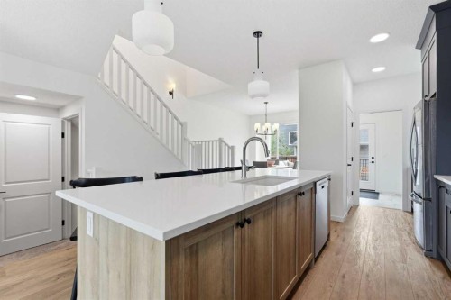 129 Treeline Avenue Sw, Calgary, AB - Indoor Photo Showing Kitchen With Upgraded Kitchen