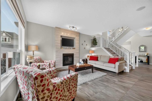 131 Cranarch Crescent Se, Calgary, AB - Indoor Photo Showing Living Room With Fireplace