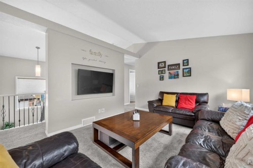 131 Cranarch Crescent Se, Calgary, AB - Indoor Photo Showing Living Room