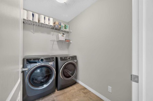 131 Cranarch Crescent Se, Calgary, AB - Indoor Photo Showing Laundry Room