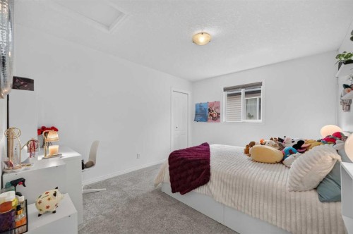 131 Cranarch Crescent Se, Calgary, AB - Indoor Photo Showing Bedroom