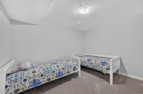 131 Cranarch Crescent Se, Calgary, AB - Indoor Photo Showing Bedroom
