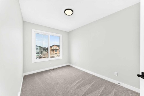 186 Lanark Gate Se, Airdrie, AB - Indoor Photo Showing Other Room
