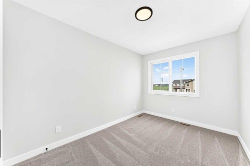 186 Lanark Gate Se, Airdrie, AB - Indoor Photo Showing Other Room