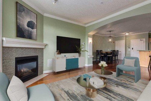 302-59 22 Avenue Sw, Calgary, AB - Indoor Photo Showing Living Room With Fireplace