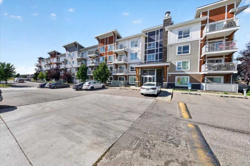 4203-302 Skyview Ranch Drive Ne, Calgary, AB - Outdoor With Balcony With Facade