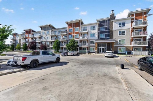 4203-302 Skyview Ranch Drive Ne, Calgary, AB - Outdoor With Balcony With Facade
