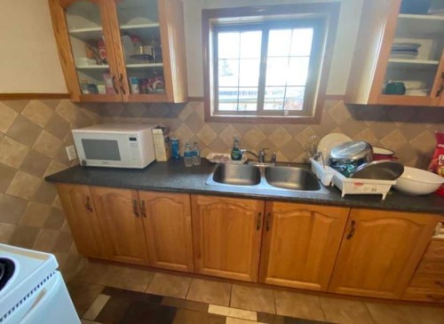 5123 19 Avenue Nw, Calgary, AB - Indoor Photo Showing Kitchen With Double Sink