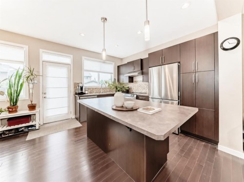 109 New Brighton Park Se, Calgary, AB - Indoor Photo Showing Kitchen With Upgraded Kitchen