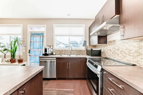 109 New Brighton Park Se, Calgary, AB - Indoor Photo Showing Kitchen