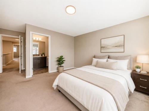 109 New Brighton Park Se, Calgary, AB - Indoor Photo Showing Bedroom