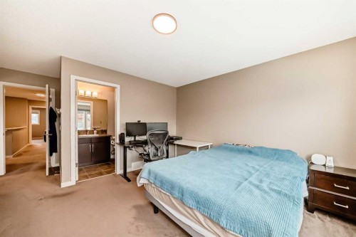 109 New Brighton Park Se, Calgary, AB - Indoor Photo Showing Bedroom