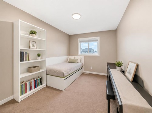 109 New Brighton Park Se, Calgary, AB - Indoor Photo Showing Bedroom