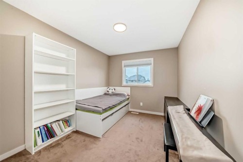 109 New Brighton Park Se, Calgary, AB - Indoor Photo Showing Bedroom