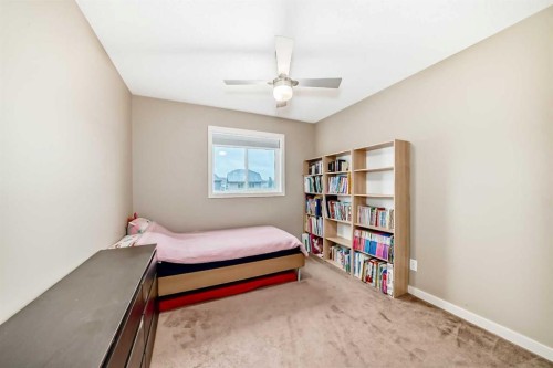 109 New Brighton Park Se, Calgary, AB - Indoor Photo Showing Bedroom