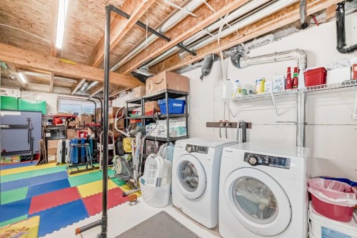 109 New Brighton Park Se, Calgary, AB - Indoor Photo Showing Laundry Room