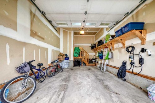 109 New Brighton Park Se, Calgary, AB - Indoor Photo Showing Garage