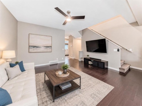 109 New Brighton Park Se, Calgary, AB - Indoor Photo Showing Living Room