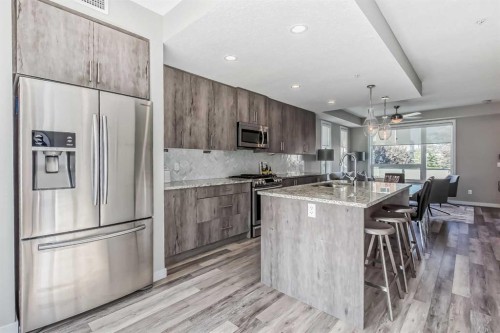 8539 8A Avenue Sw, Calgary, AB - Indoor Photo Showing Kitchen With Upgraded Kitchen