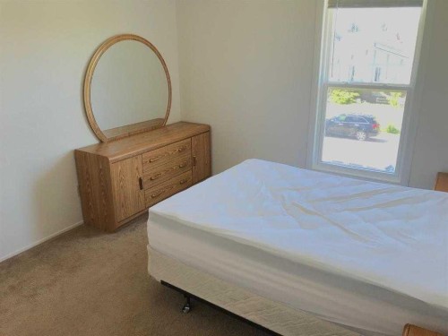 4820 60 Street, Calgary, AB - Indoor Photo Showing Bedroom