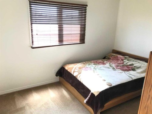 4820 60 Street, Calgary, AB - Indoor Photo Showing Bedroom