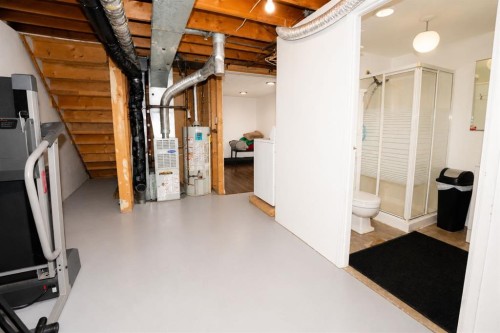 6527 Huntsbay Road Nw, Calgary, AB - Indoor Photo Showing Basement