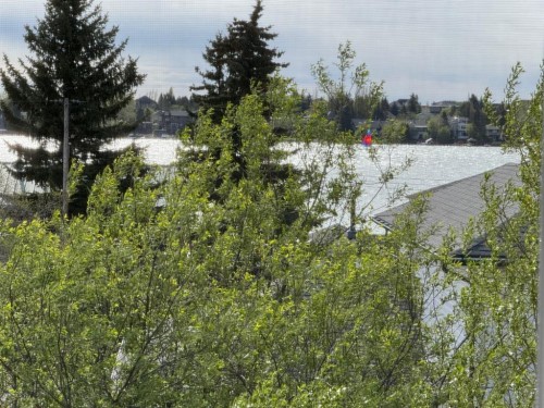 418 Long Beach Landing, Chestermere, AB - Outdoor With Body Of Water With View