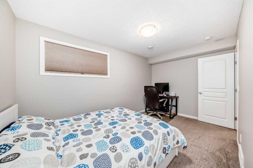 264 Auburn Bay Drive Se, Calgary, AB - Indoor Photo Showing Bedroom