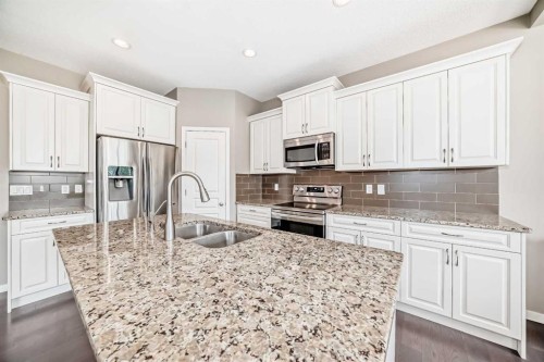 264 Auburn Bay Drive Se, Calgary, AB - Indoor Photo Showing Kitchen With Stainless Steel Kitchen With Double Sink With Upgraded Kitchen