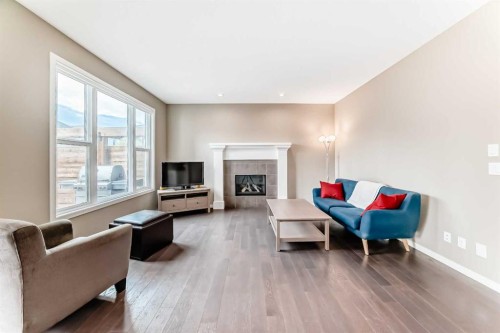 264 Auburn Bay Drive Se, Calgary, AB - Indoor Photo Showing Living Room With Fireplace