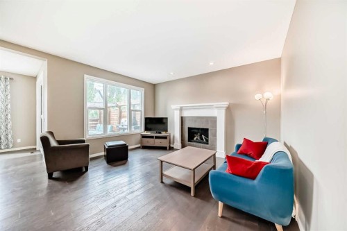 264 Auburn Bay Drive Se, Calgary, AB - Indoor Photo Showing Living Room With Fireplace