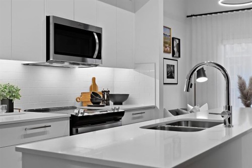 516-310 15 Avenue Sw, Calgary, AB - Indoor Photo Showing Kitchen With Double Sink With Upgraded Kitchen