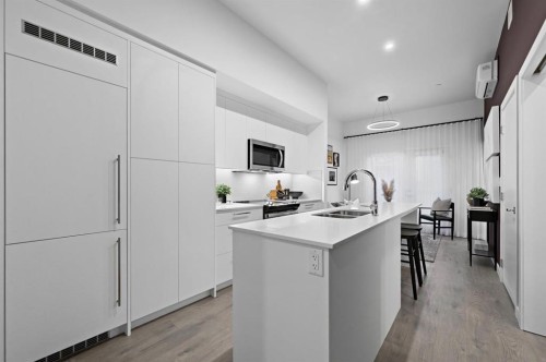 516-310 15 Avenue Sw, Calgary, AB - Indoor Photo Showing Kitchen With Double Sink