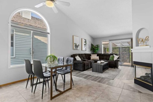 26 Chaparral Close Se, Calgary, AB - Indoor Photo Showing Other Room With Fireplace