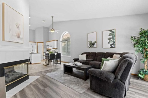 26 Chaparral Close Se, Calgary, AB - Indoor Photo Showing Living Room With Fireplace