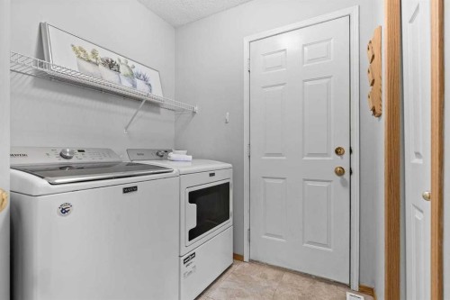 26 Chaparral Close Se, Calgary, AB - Indoor Photo Showing Laundry Room