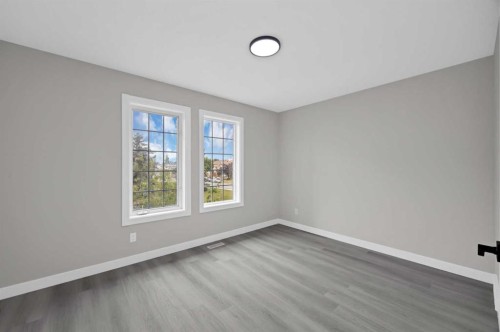 68 Laguna Close Ne, Calgary, AB - Indoor Photo Showing Other Room
