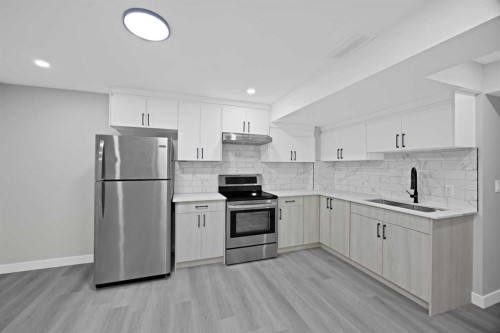 68 Laguna Close Ne, Calgary, AB - Indoor Photo Showing Kitchen With Stainless Steel Kitchen