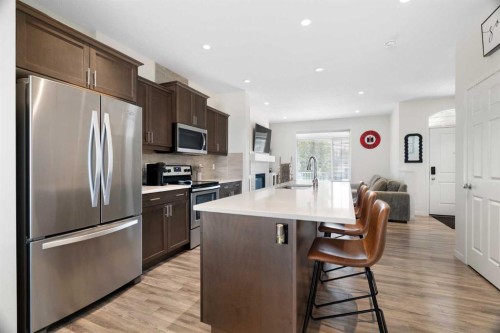 57 Amery Crescent, Crossfield, AB - Indoor Photo Showing Kitchen With Stainless Steel Kitchen With Upgraded Kitchen