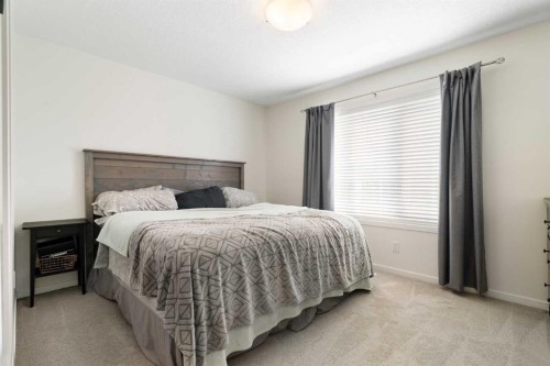 57 Amery Crescent, Crossfield, AB - Indoor Photo Showing Bedroom