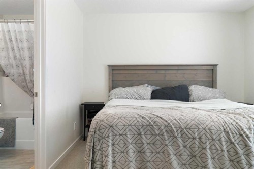 57 Amery Crescent, Crossfield, AB - Indoor Photo Showing Bedroom